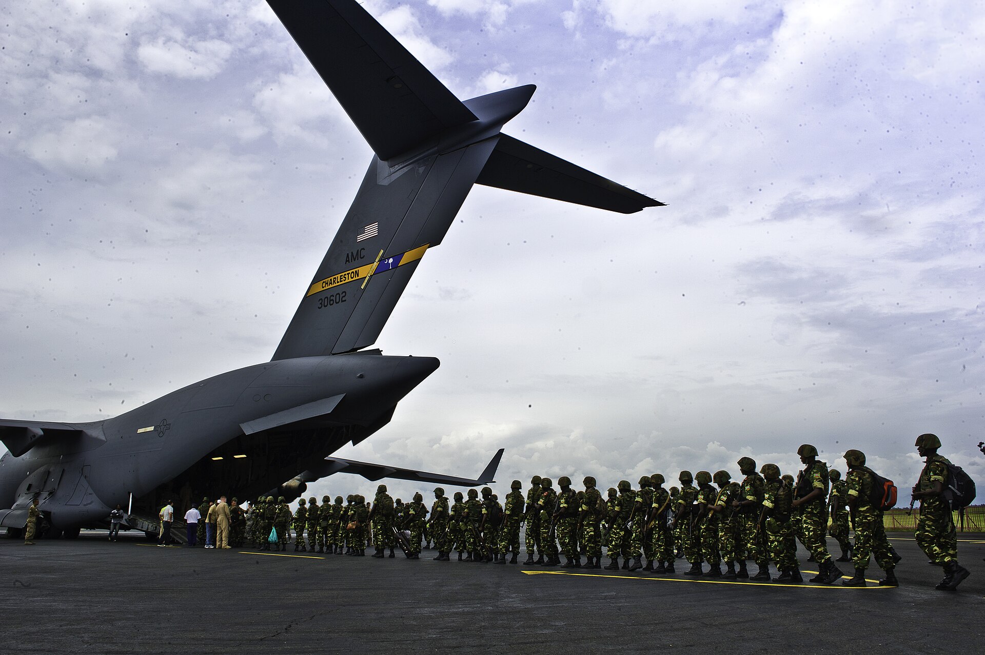 Burundi soldiers prepare to load onto a C-17 Globemaster Dec. 13, 2013 at Bujmumbura Airport, Burundi. In coordination with the French