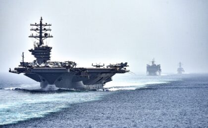 CVN 69 transits the Strait of Hormuz (28465403076) — Saudi Arabia